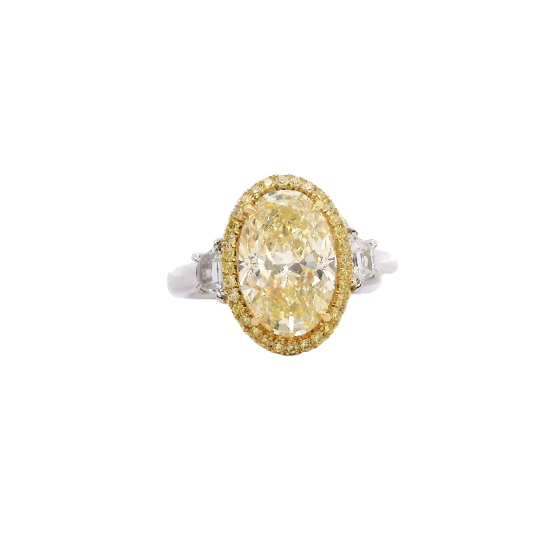 Stunning Jewelry At Even More Stunning Prices Oval Fancy Yellow Diamond Platinum and 18kt Yellow Gold Ring Stunning Jewelry At Even More Stunning Prices Oval Fancy Yellow Diamond Platinum and 18kt Yellow Gold Ring