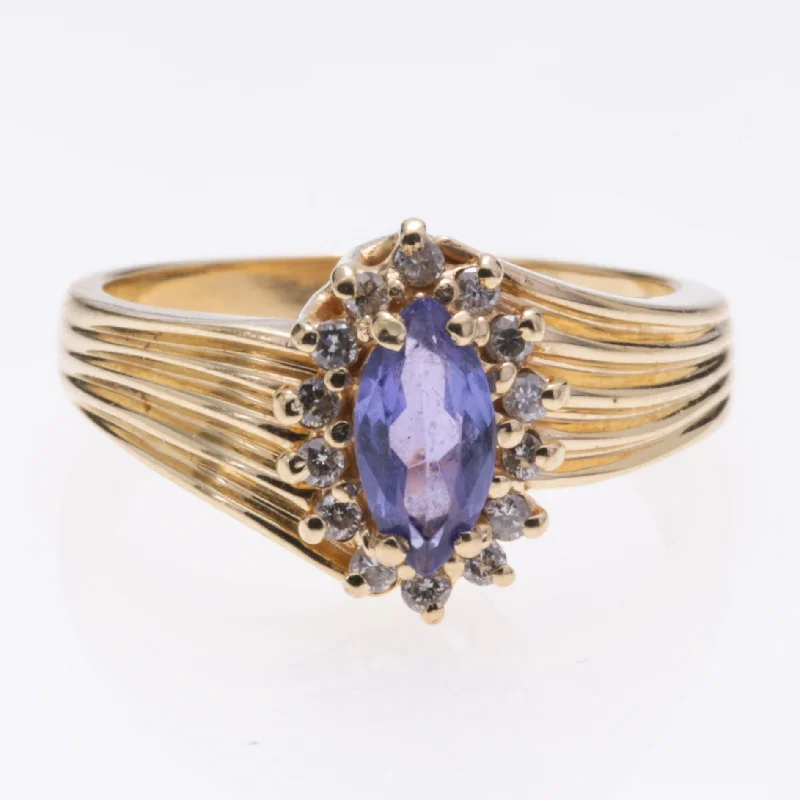 Special Offers On Handcrafted And Designer Jewelry 14K Yellow Gold Tanzanite and Diamond Ring | 0.47ct, 0.14ctw | SZ 6.5 Special Offers On Handcrafted And Designer Jewelry 14K Yellow Gold Tanzanite and Diamond Ring | 0.47ct, 0.14ctw | SZ 6.5