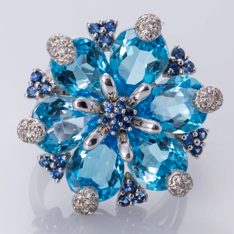 Breathtaking Jewelry, Breathtaking Prices 18K White Gold Blue Topaz, Sapphire, and Diamond Ring | 18.48 ctw, 0.42 ctw, 0.65 ctw | SZ 9 | Breathtaking Jewelry, Breathtaking Prices 18K White Gold Blue Topaz, Sapphire, and Diamond Ring | 18.48 ctw, 0.42 ctw, 0.65 ctw | SZ 9 |