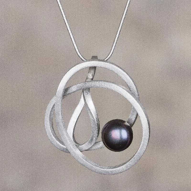Luxury Handcrafted Jewelry For Elegant Looks Dark Amazon Nest Modern Silver Necklace with a Dark Grey Cultured Pearl Luxury Handcrafted Jewelry For Elegant Looks Dark Amazon Nest Modern Silver Necklace with a Dark Grey Cultured Pearl