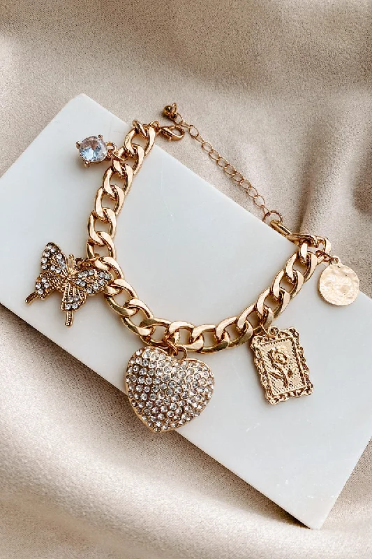 Last Chance To Shop High-End Jewelry At Markdown Prices She's Got The Spark Charm Bracelet (Gold) Last Chance To Shop High-End Jewelry At Markdown Prices She's Got The Spark Charm Bracelet (Gold)