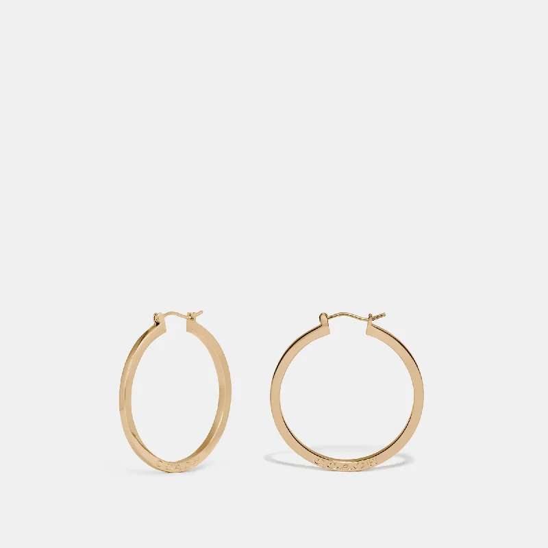 Sparkle On A Budget – Fine Jewelry For Less Coach Outlet Hoop Earrings
