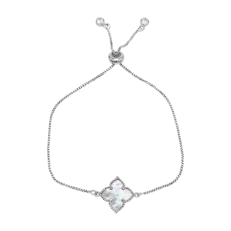 Premium Jewelry Now Available At Special Discounts Rhodium Plated White Mother of Pearl Flower Adjustable Bolo Bracelet Premium Jewelry Now Available At Special Discounts Rhodium Plated White Mother of Pearl Flower Adjustable Bolo Bracelet